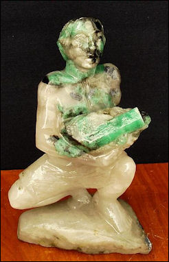 20120530-Emerald Miner_carrying_an_Emerald_Crystal.jpg